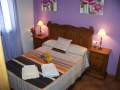 Dormitorio matrimonio violeta
