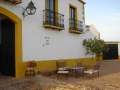 Vista puerta de entrada y parte de fachada de Cortijo Molino San Juan 